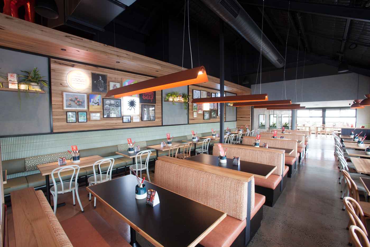 Hospitality fitout Melbourne booth seating and feature lighting at Grill'd Tunstall Square restaurant interior