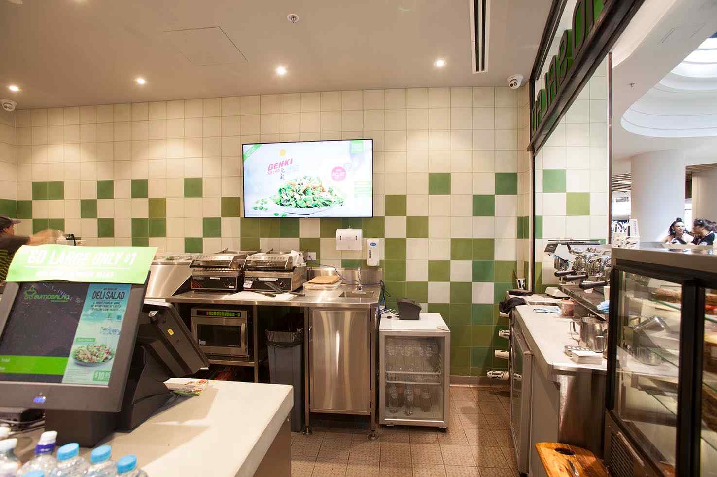 Back-of-house restaurant fit-out with custom joinery and food preparation workstations at SumoSalad Chadstone.