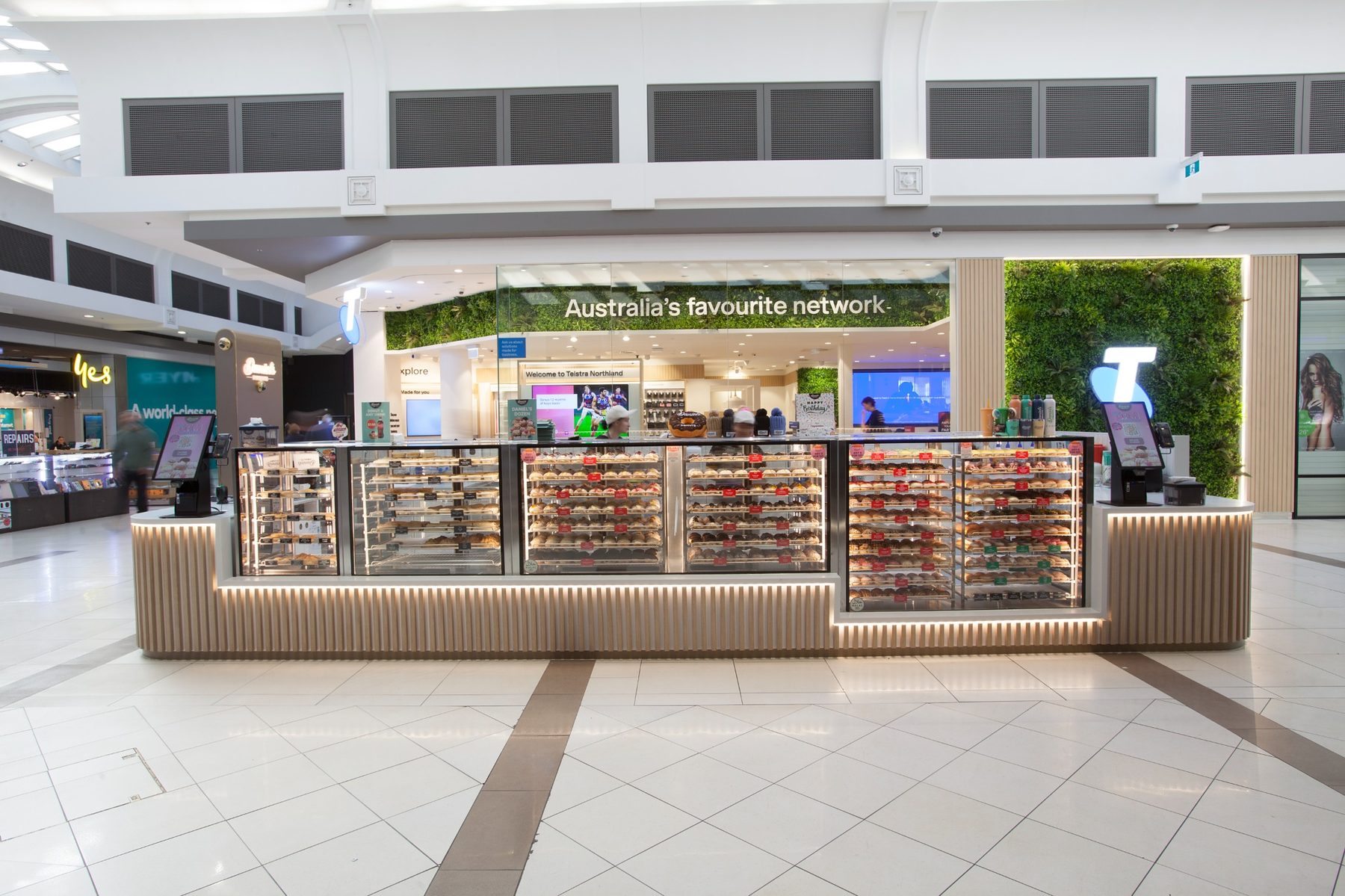 Front view of Daniels Donuts retail kiosk fitout at Northland Shopping Centre by Shape Shopfitters.